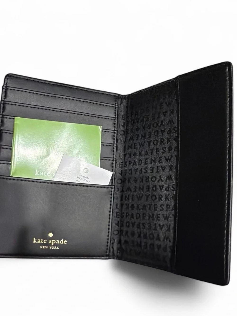kate spade Black Pebbled Leather Passport Cover with Gold Plaque